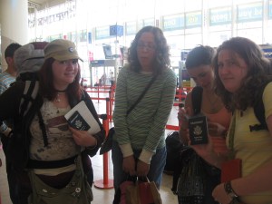 Clearly disappointed....traveling Eastern Europe in 2008, my American companions show disgust over our miniscule passports.